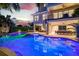 Expansive pool and spa with waterfall feature and outdoor entertaining area at 171 Mckinley Dr, Sarasota, FL 34236