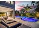 Pool and patio area with lounge chairs, offering sunset views at 171 Mckinley Dr, Sarasota, FL 34236