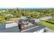 Rooftop deck with seating area and partial ocean view at 171 Mckinley Dr, Sarasota, FL 34236