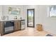 Wet bar with wine cooler, beverage fridge, and access to deck at 171 Mckinley Dr, Sarasota, FL 34236
