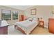 Well-lit bedroom with a double bed and ample closet space at 204 Crew Ct, Sarasota, FL 34243