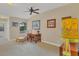 Cozy bedroom with a desk, chair, and ceiling fan at 204 Crew Ct, Sarasota, FL 34243