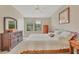Main bedroom with king-size bed and large windows at 204 Crew Ct, Sarasota, FL 34243