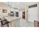 Kitchen with white cabinets, granite counters, and stainless steel appliances at 204 Crew Ct, Sarasota, FL 34243