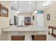 Modern kitchen with granite countertops and stainless steel appliances at 204 Crew Ct, Sarasota, FL 34243