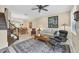 Open living room with hardwood stairs and dining area view at 204 Crew Ct, Sarasota, FL 34243