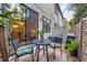 Private patio with table, chairs, and grill at 204 Crew Ct, Sarasota, FL 34243