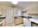 Laundry room with built-in cabinets and washer/dryer at 2370 Little Country Rd, Parrish, FL 34219