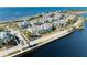 Community overview featuring waterfront homes and landscaping at 311 Compass Point Dr # 201, Bradenton, FL 34209