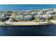 Community overview featuring waterfront homes and landscaping at 311 Compass Point Dr # 201, Bradenton, FL 34209