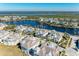 Wide aerial view of waterfront homes and community at 311 Compass Point Dr # 201, Bradenton, FL 34209