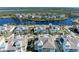 Community overview featuring waterfront homes and landscaping at 311 Compass Point Dr # 201, Bradenton, FL 34209