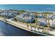 Community overview featuring waterfront homes and landscaping at 311 Compass Point Dr # 201, Bradenton, FL 34209