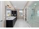 Spa-like bathroom with double vanity and large shower at 311 Compass Point Dr # 201, Bradenton, FL 34209