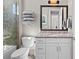 Clean bathroom with single vanity, tub shower combo, and granite countertop at 311 Compass Point Dr # 201, Bradenton, FL 34209