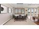 Elegant dining room with a dark wood table and built-in bench at 311 Compass Point Dr # 201, Bradenton, FL 34209
