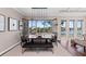 Spacious dining area with water views and a stylish light fixture at 311 Compass Point Dr # 201, Bradenton, FL 34209
