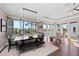 Sunlit dining room showcasing water views and a unique ceiling design at 311 Compass Point Dr # 201, Bradenton, FL 34209