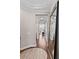 Elegant hallway with hardwood floors and high ceilings at 311 Compass Point Dr # 201, Bradenton, FL 34209
