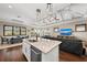 Modern kitchen boasting granite countertops and stainless steel appliances at 311 Compass Point Dr # 201, Bradenton, FL 34209