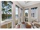 Relaxing sitting area with large windows and water views at 311 Compass Point Dr # 201, Bradenton, FL 34209
