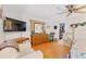 Spacious bedroom with large TV, dresser, and seating area at 339 Rio De Janeiro Ave, Punta Gorda, FL 33983