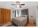 Cozy bedroom with a double bed and ceiling fan at 339 Rio De Janeiro Ave, Punta Gorda, FL 33983