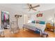 Primary bedroom featuring a king-size bed, walk-in closet, and cat tree at 339 Rio De Janeiro Ave, Punta Gorda, FL 33983