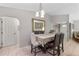 Dining area with table and chairs near kitchen and entryway at 339 Rio De Janeiro Ave, Punta Gorda, FL 33983