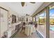 Screened lanai with dining area and pool view at 339 Rio De Janeiro Ave, Punta Gorda, FL 33983