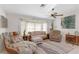 Spacious living room with neutral color palette and comfy seating at 339 Rio De Janeiro Ave, Punta Gorda, FL 33983