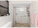 Walk-in shower with tiled floor and glass doors at 339 Rio De Janeiro Ave, Punta Gorda, FL 33983