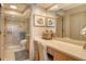 Elegant bathroom with vanity and walk-in shower at 3416 W Chelmsford Ct # 2, Sarasota, FL 34235