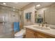 Bathroom with walk-in shower and updated fixtures at 3416 W Chelmsford Ct # 2, Sarasota, FL 34235