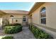 Private courtyard with wrought iron gate and brick pavers at 3416 W Chelmsford Ct # 2, Sarasota, FL 34235