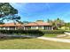 Well-maintained exterior with a tiled roof and screened lanai at 3416 W Chelmsford Ct # 2, Sarasota, FL 34235