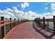 Modern wooden footbridge with railings at 3416 W Chelmsford Ct # 2, Sarasota, FL 34235