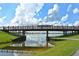 Wooden footbridge over calm water at 3416 W Chelmsford Ct # 2, Sarasota, FL 34235