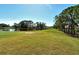 Scenic golf course view with water features and lush fairways at 3416 W Chelmsford Ct # 2, Sarasota, FL 34235
