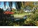 Peaceful golf course view with water feature at 3416 W Chelmsford Ct # 2, Sarasota, FL 34235