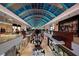 Two-level mall interior with shops and walkways at 3416 W Chelmsford Ct # 2, Sarasota, FL 34235