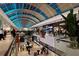Upscale two-level shopping mall interior with various stores at 3416 W Chelmsford Ct # 2, Sarasota, FL 34235
