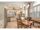 Well-equipped kitchen with stainless steel appliances and breakfast table at 3416 W Chelmsford Ct # 2, Sarasota, FL 34235