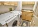 Convenient laundry room with washer and dryer hookups at 3416 W Chelmsford Ct # 2, Sarasota, FL 34235