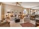 Spacious living room featuring comfortable seating and a view into the dining area at 3416 W Chelmsford Ct # 2, Sarasota, FL 34235