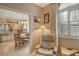 Relaxing home office with comfortable chair and view of kitchen at 3416 W Chelmsford Ct # 2, Sarasota, FL 34235
