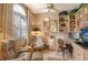 Cozy home office with built-in shelving and comfortable seating at 3416 W Chelmsford Ct # 2, Sarasota, FL 34235