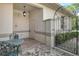 Covered patio with wrought iron gate and brick pavers at 3416 W Chelmsford Ct # 2, Sarasota, FL 34235