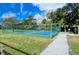 Outdoor pickleball courts with a walking path nearby at 3416 W Chelmsford Ct # 2, Sarasota, FL 34235