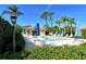 Relaxing community pool area with shaded seating at 3416 W Chelmsford Ct # 2, Sarasota, FL 34235